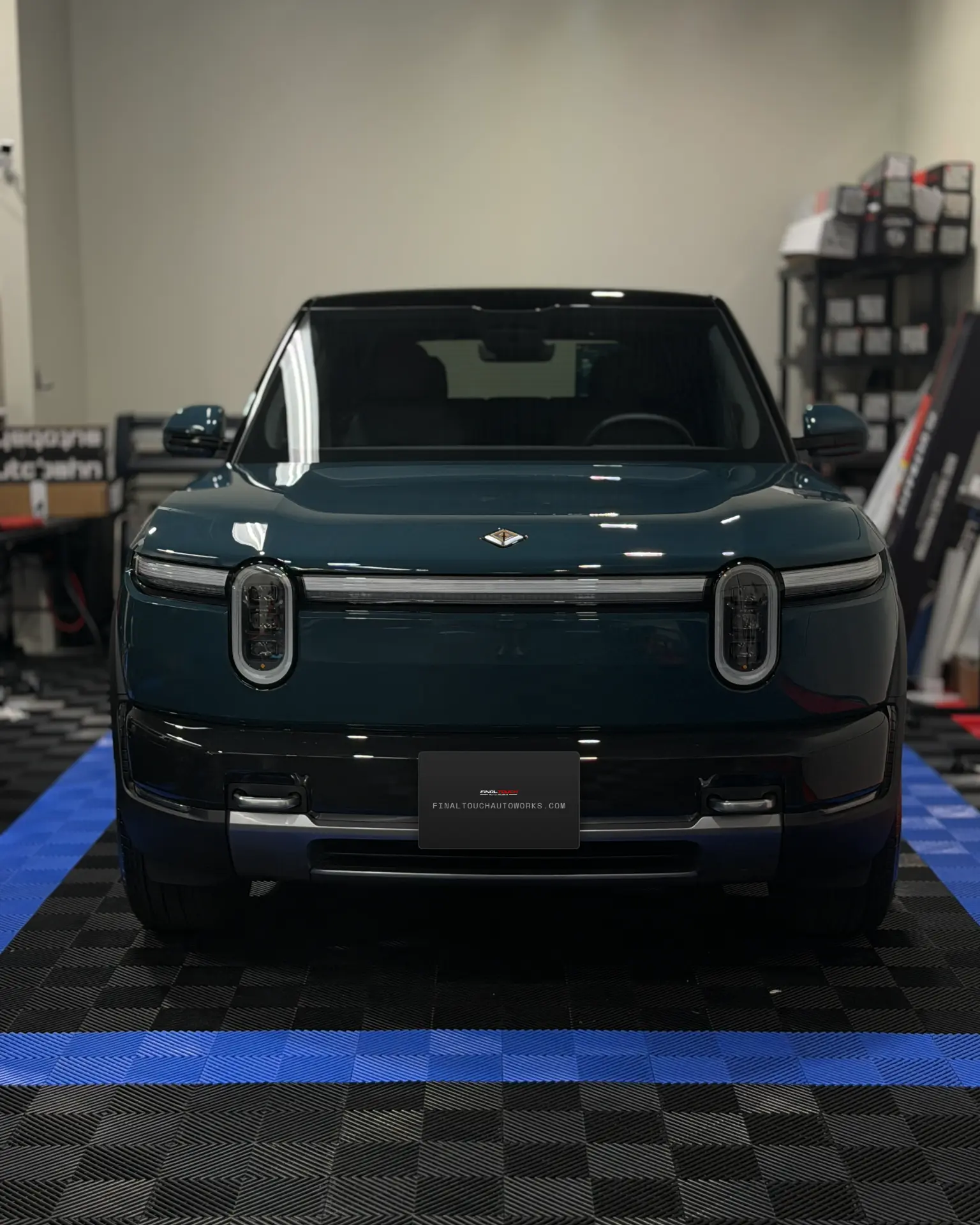 Green Rivian R1S ceramic coated at Final Touch Auto Works in St. Louis Park