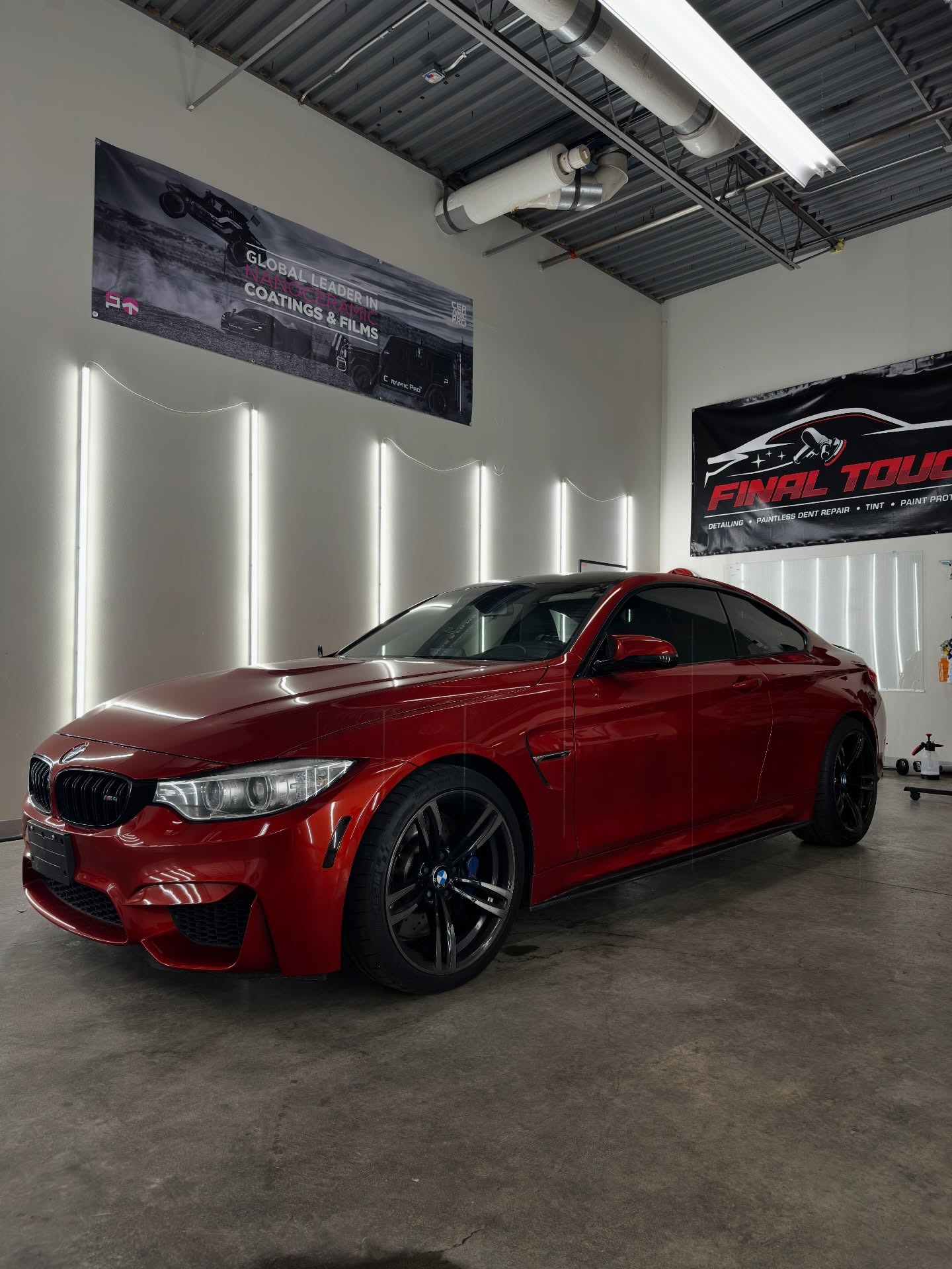 Ceramic-coated red BMW M4 in the Final Touch Auto Works studio